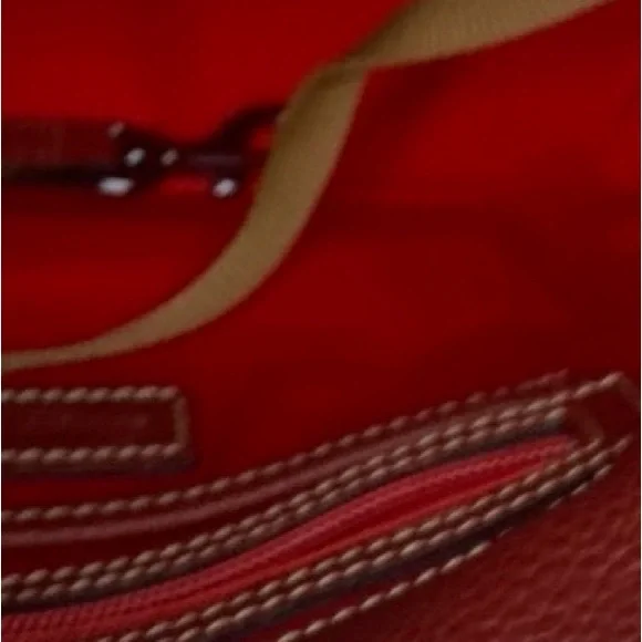 Dooney & Bourke Wine Red Pebbled Tassel Shoulder Bag
